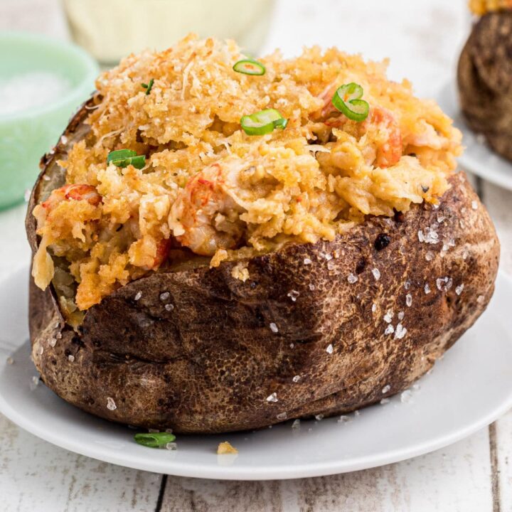 Close up of a crawfish baked potato cropped square.