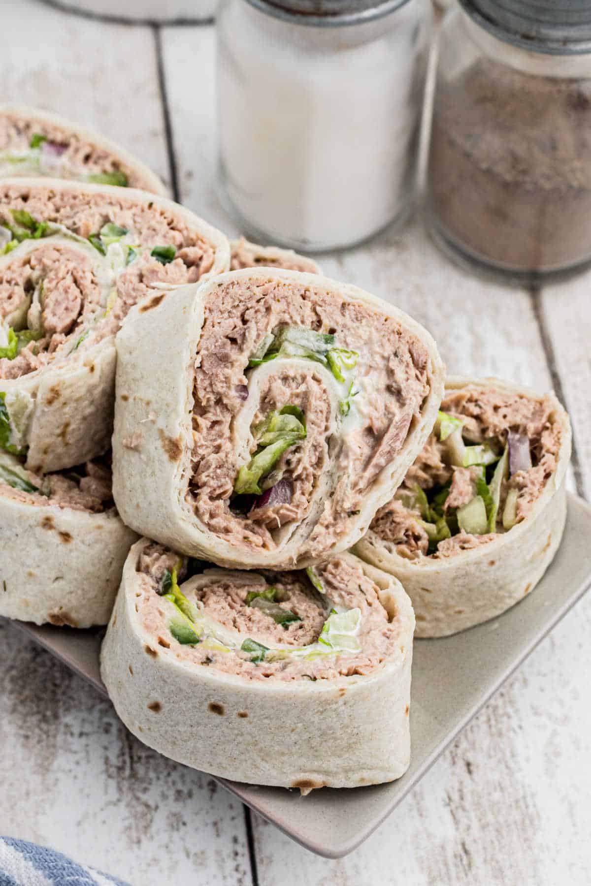 Close up portrait image of some tuna pinwheels.