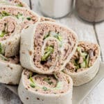 Close up of some tuna pinwheels with text overlay for pinterest.