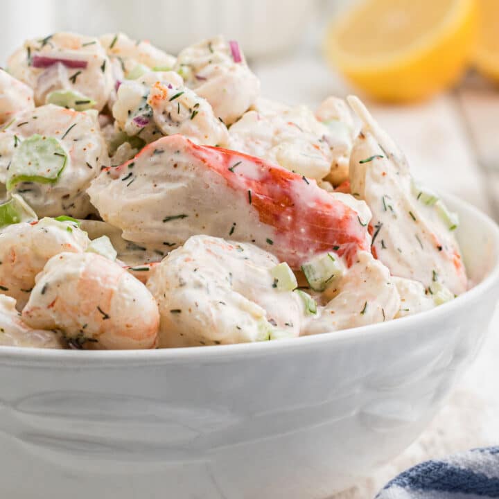 A close up of a bowl of southern seafood salad recipe.