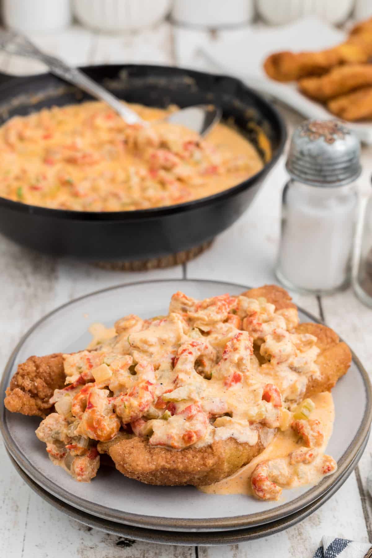 Crawfish sauce poured over fried fish.