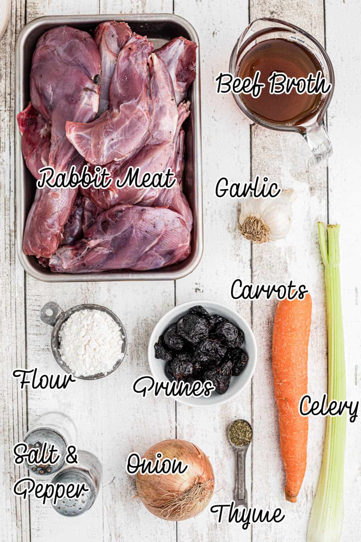 Ingredients laid out with text overlay, for what is needed to make a slow cooker rabbit stew.