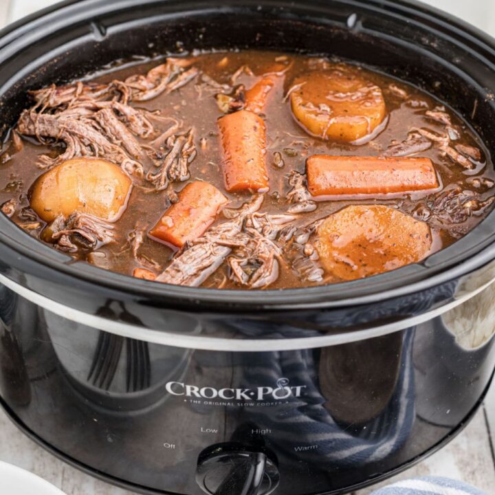 Slow cooker venison roast with red wine and carrots and potatoes.
