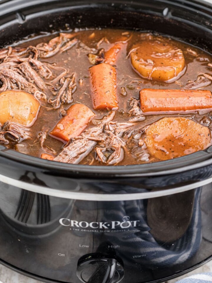 Slow cooker venison roast with red wine and carrots and potatoes.