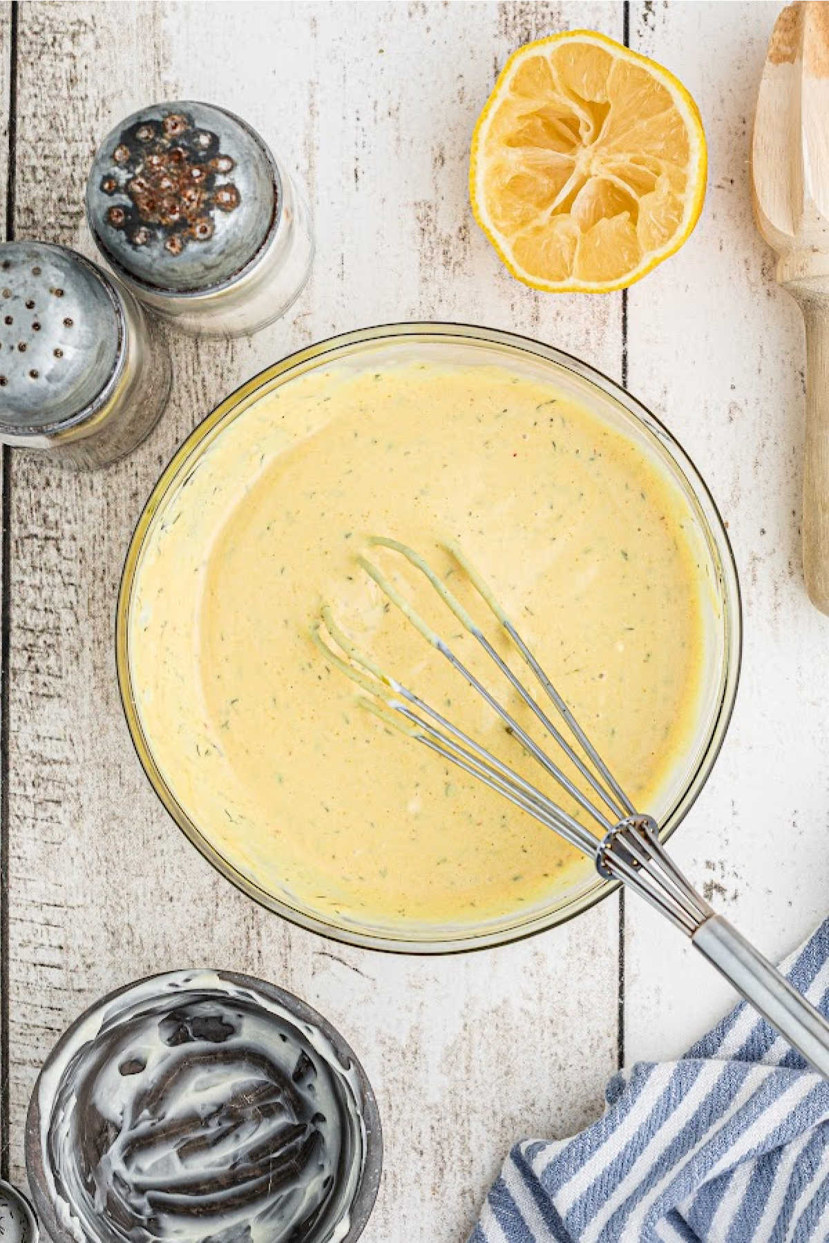 A small glass bowl with a delicious looking breakfast sauce.