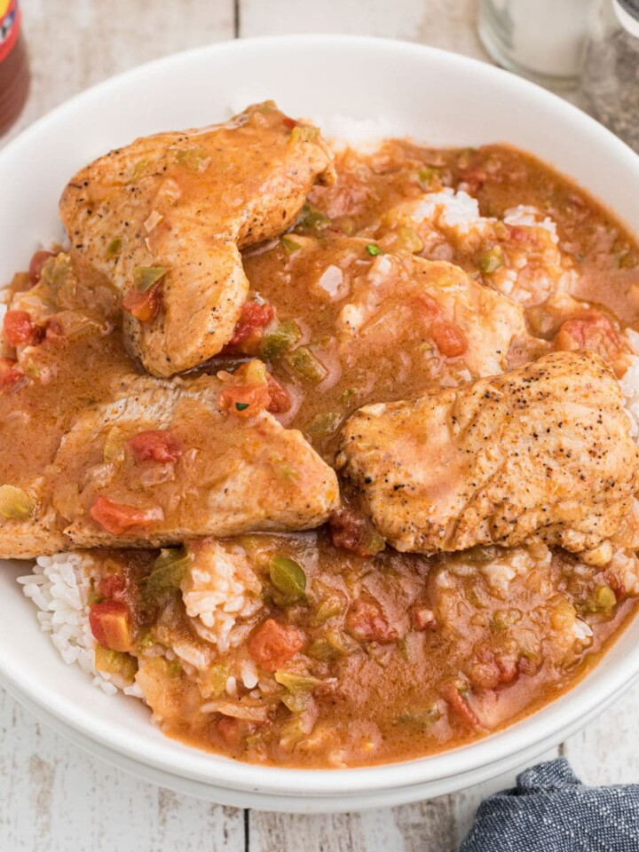 Overhead close up of a bowl of catfish courtbouillon over rice.