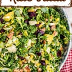 A close up of a bowl of kale salad from cracker barrel with text overlay for pinterest.