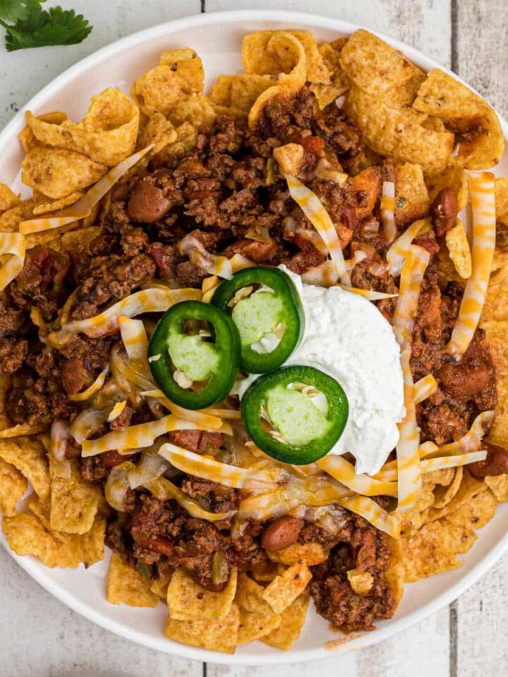 Overhead shot of a plate full of crockpot Frito pie.