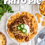 Overhead image of a crockpot frito pie with text overlay for pinterest.
