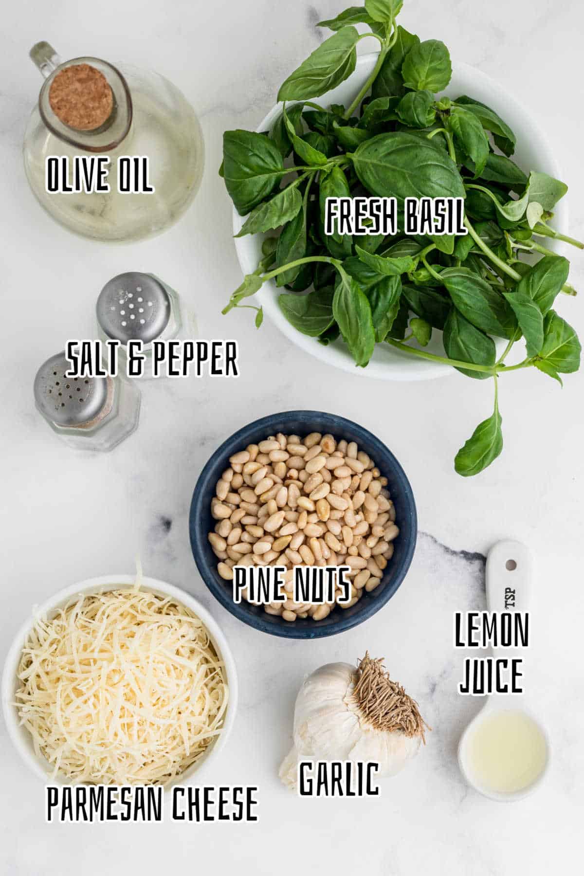 Overhead shot of ingredients needed to make a pesto dressing.
