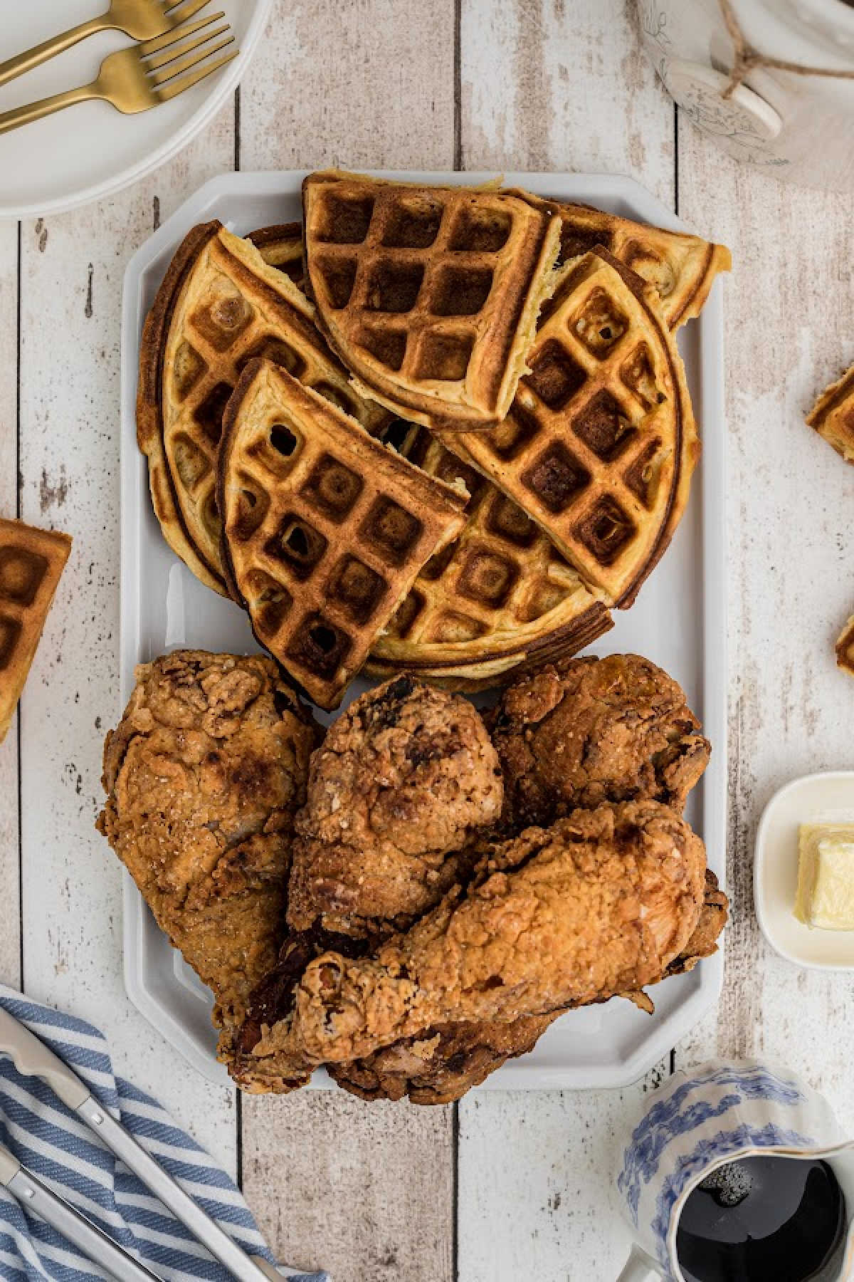 A platter with fried chicken and waffles.