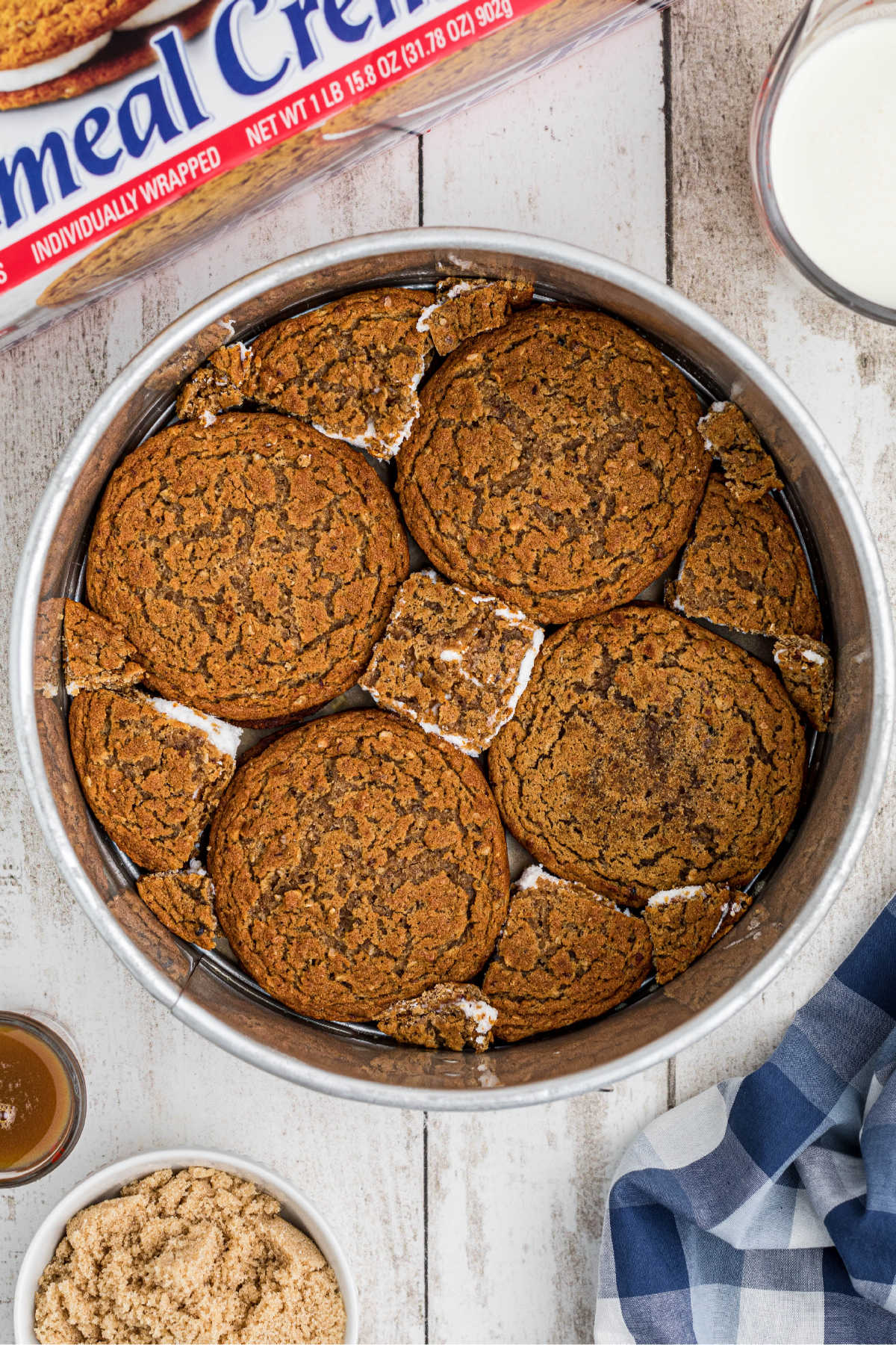 Oatmeal creme pie cookies lining a base of a pie dish.