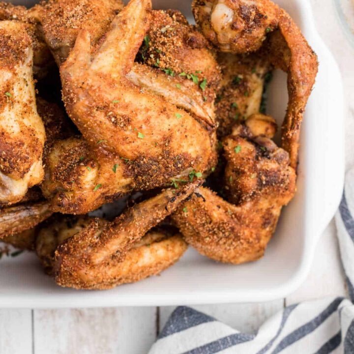Wingstop Louisiana Rub Recipe on some wings cooked and in a dish.