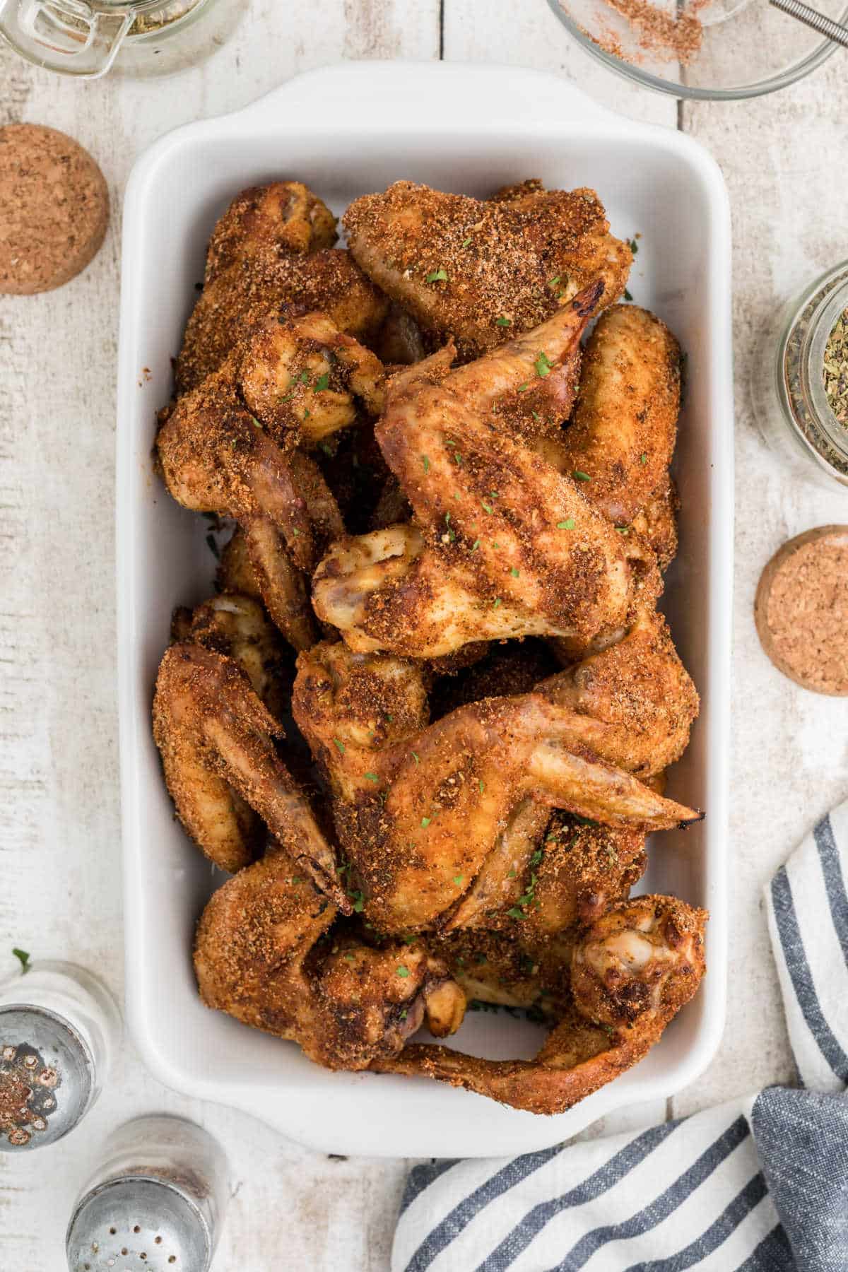 Overhead shot of a dish of wings cooked with Wingstop Louisiana Rub Recipe.