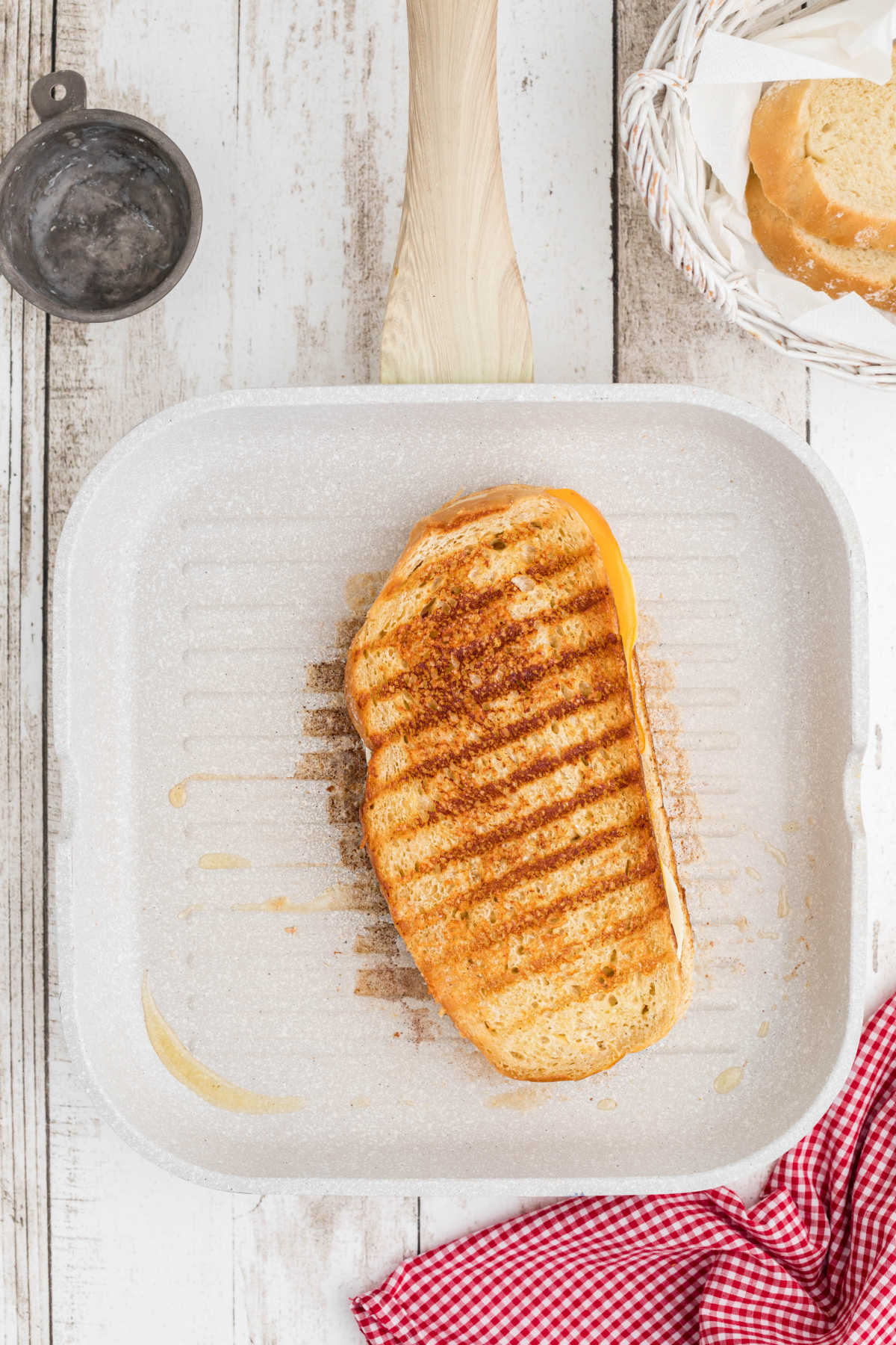 A starbucks grilled cheese in a grill pan.
