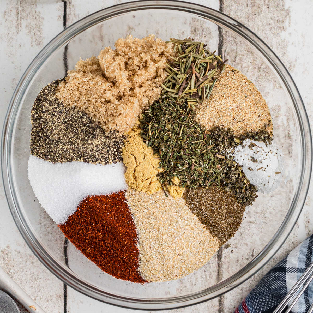 Overhead shot of a bowl full of spices, to make a Smoked Turkey Rub Recipe.