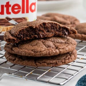 Close up of a Nutella Brownie Cookies recipe with one broke in half.