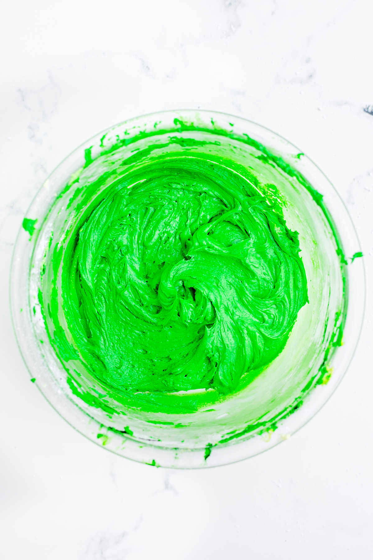 A vibrant green colored frosting.