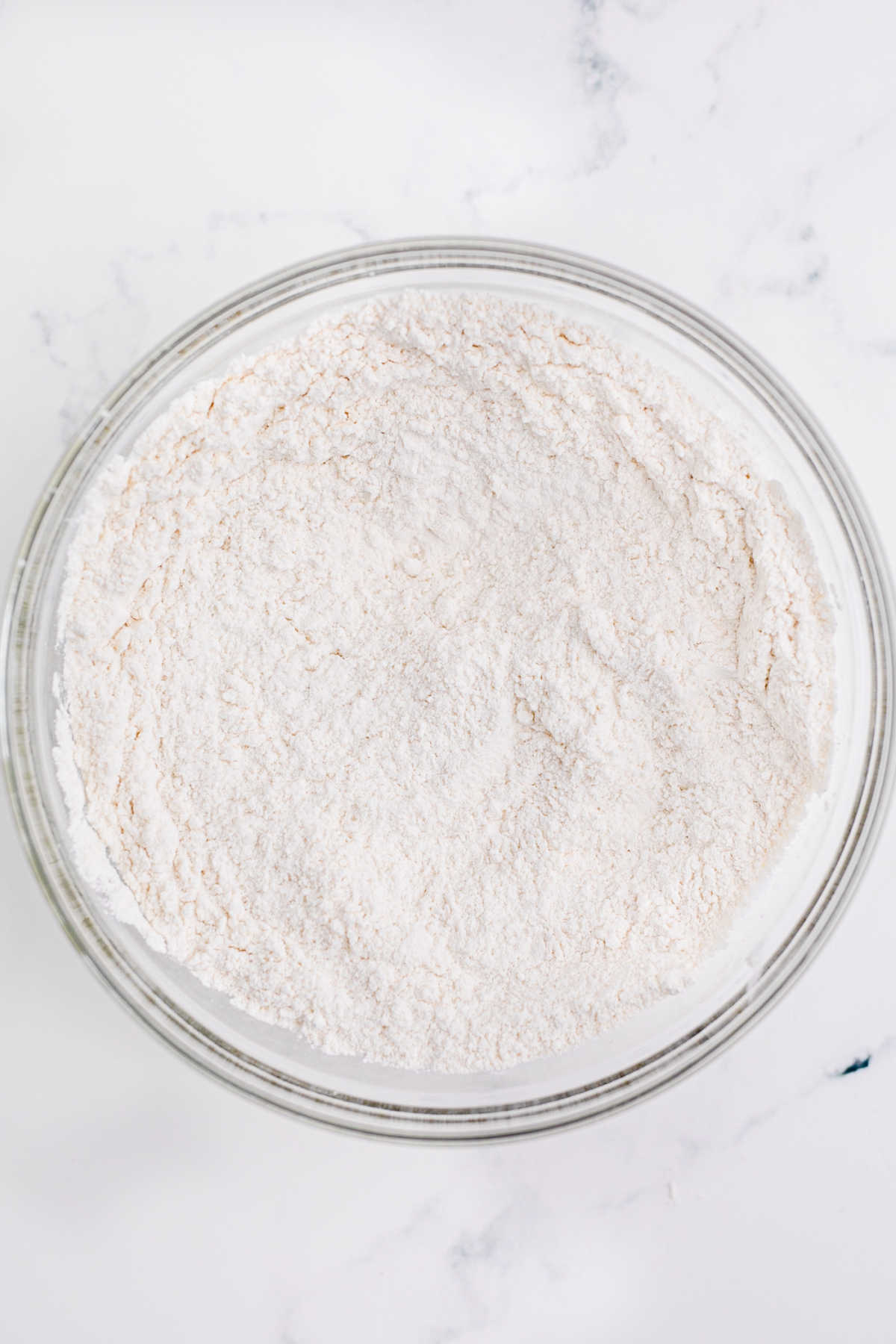 A mixing bowl full of flour.