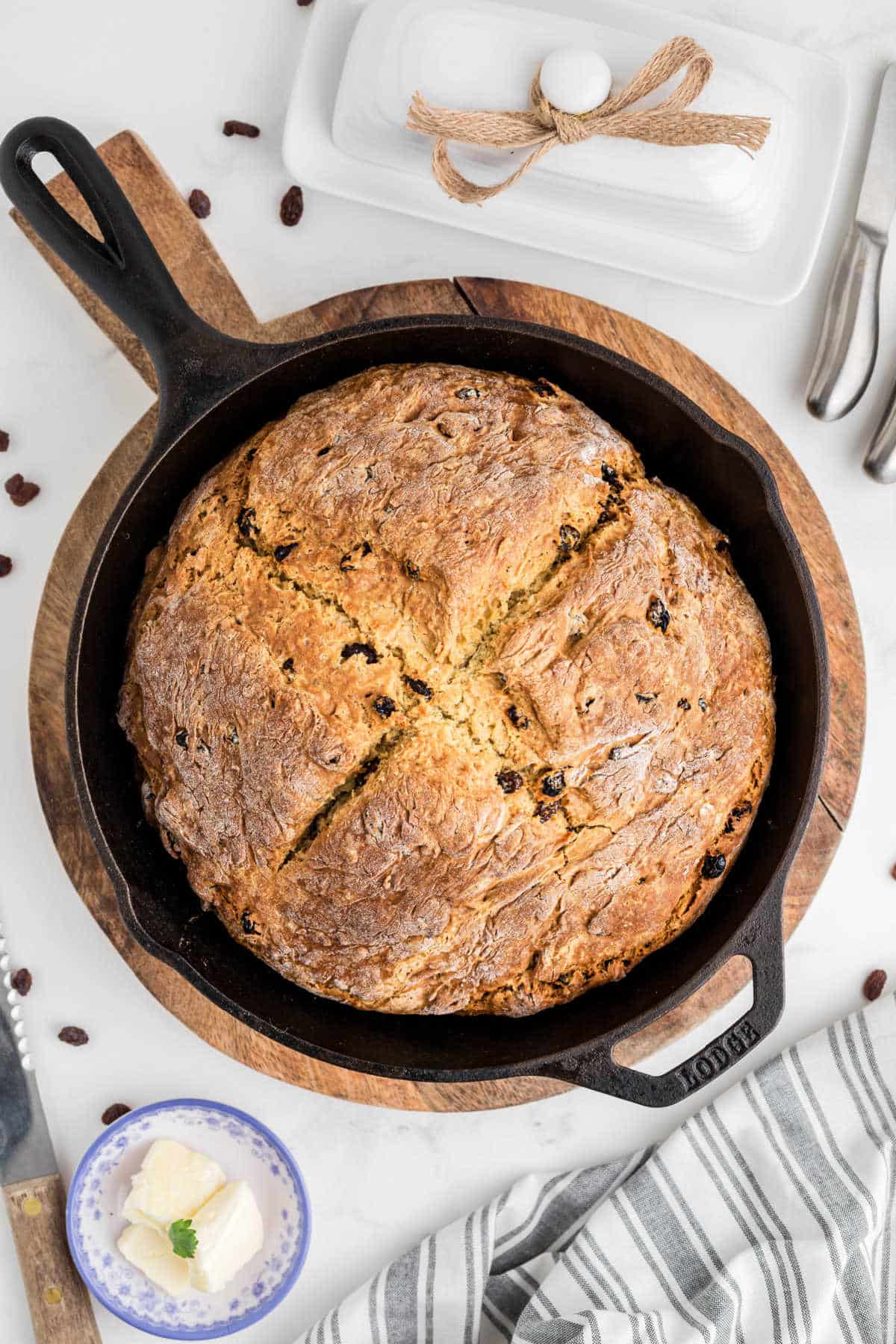 A skillet with a quick irish soda bread just cooked.