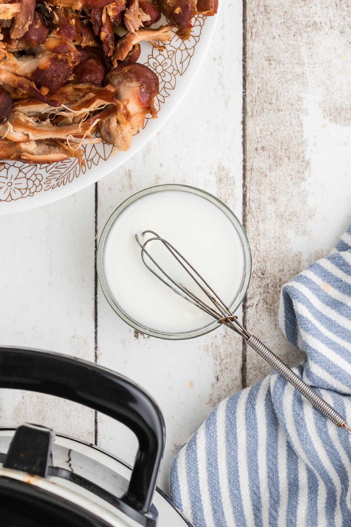 Cornstarch mixture with a small whisk.