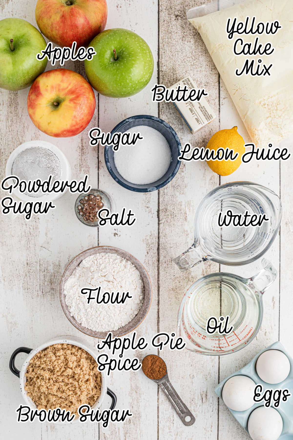 Overhead shot of ingredients needed to make an apple pie cake, with text overlay.