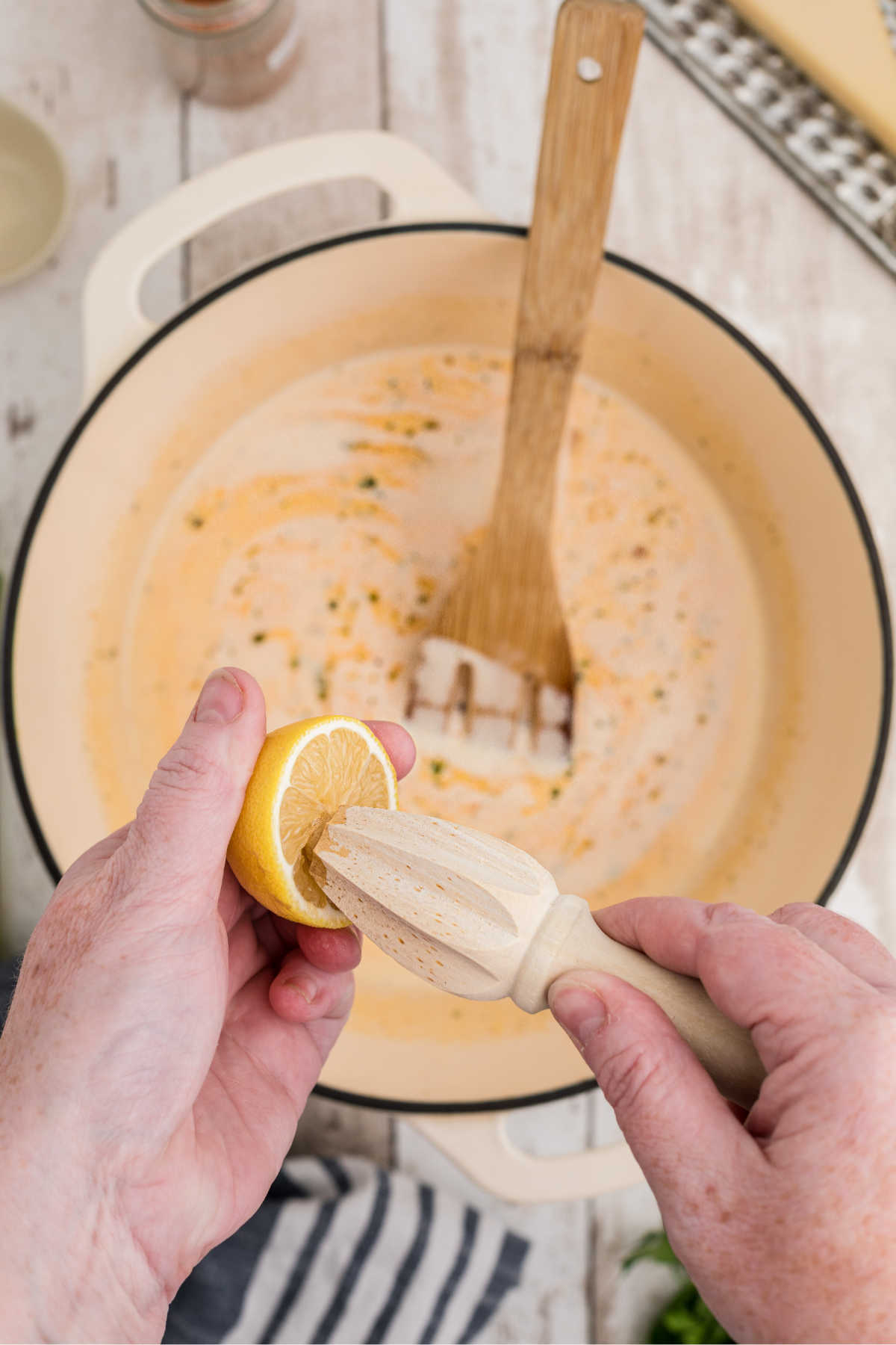 A lemon being squeezed.