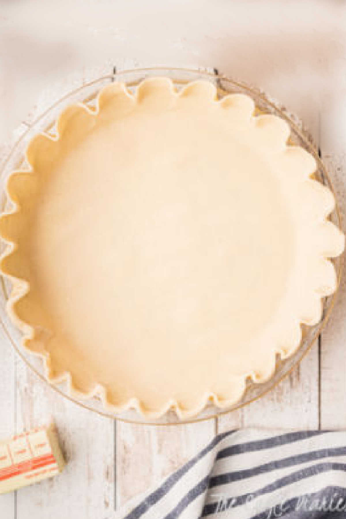 A pie crust pressed into a dish.