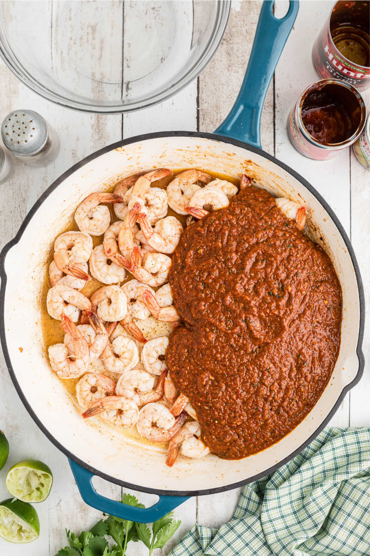 Sauce and shrimp in a large skillet.