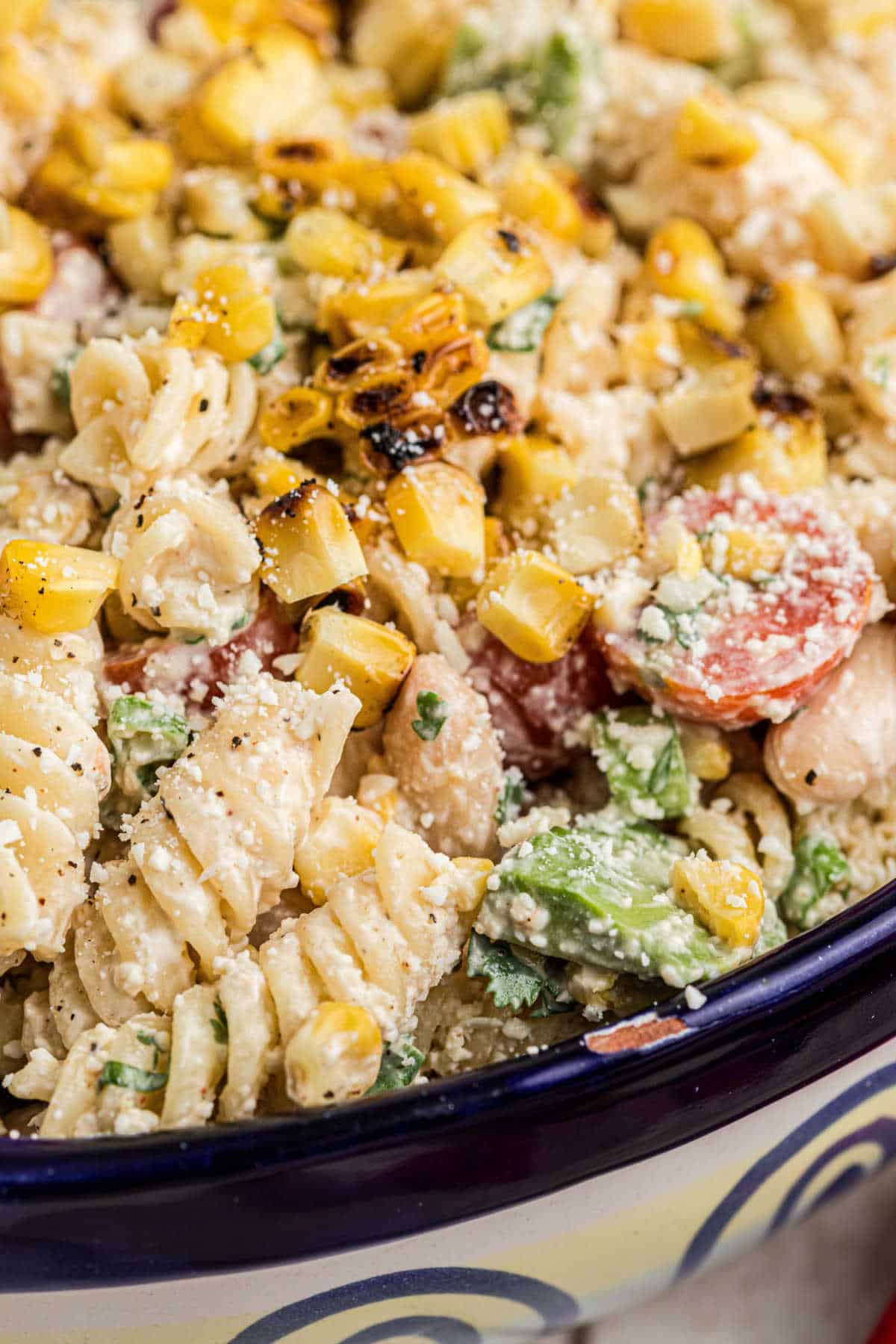 Close up shot of a bowl of Elotes pasta salad.