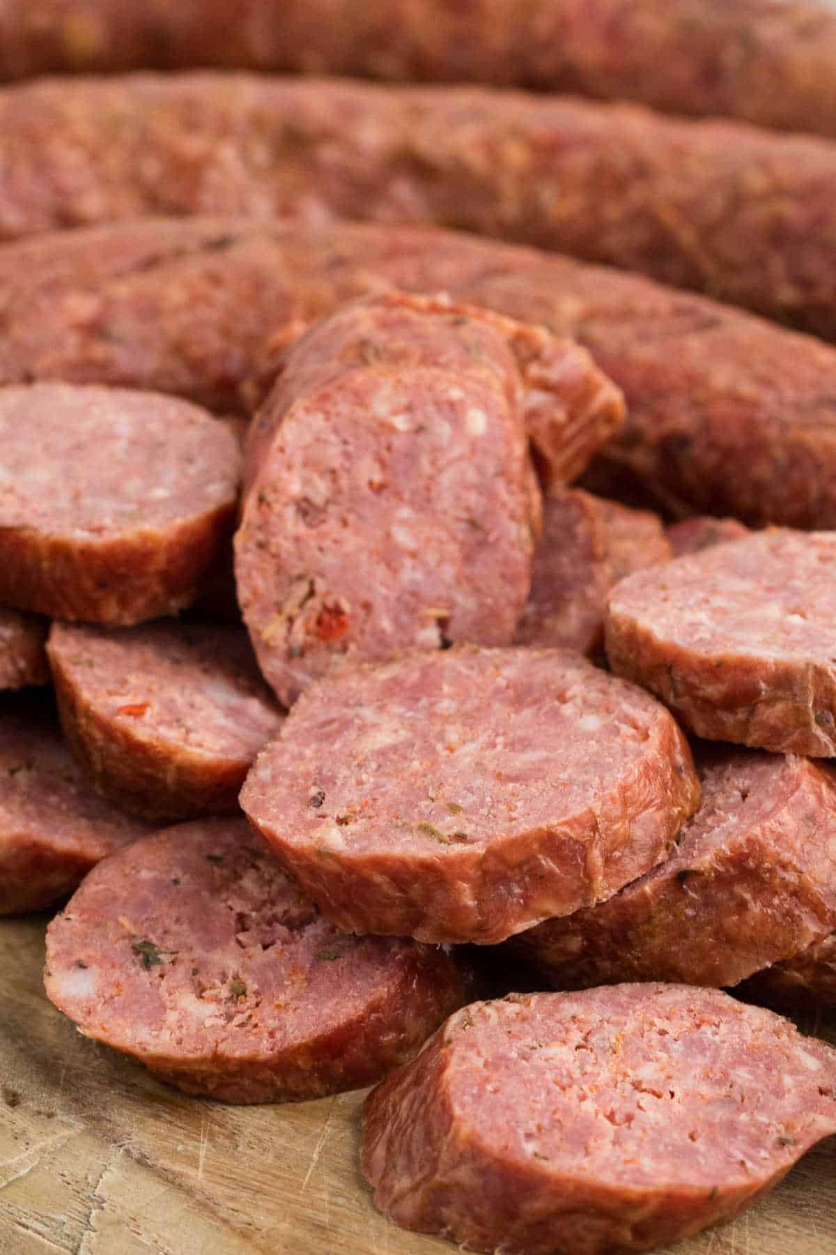A very close up image of some sliced andouille sausage.