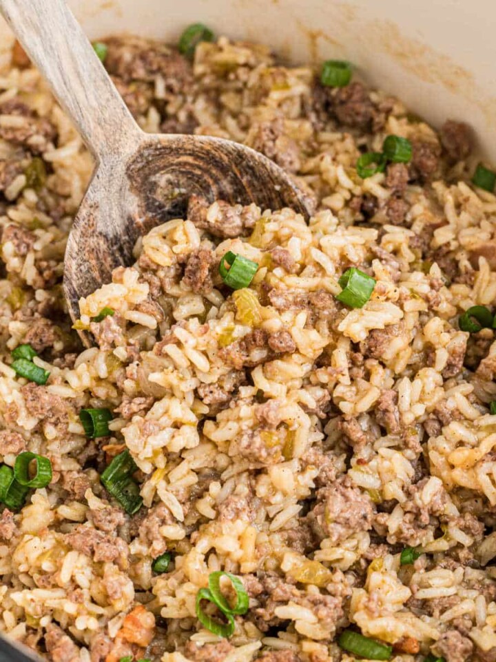 Close up of some Louisiana dirty rice with a spoon digging in.