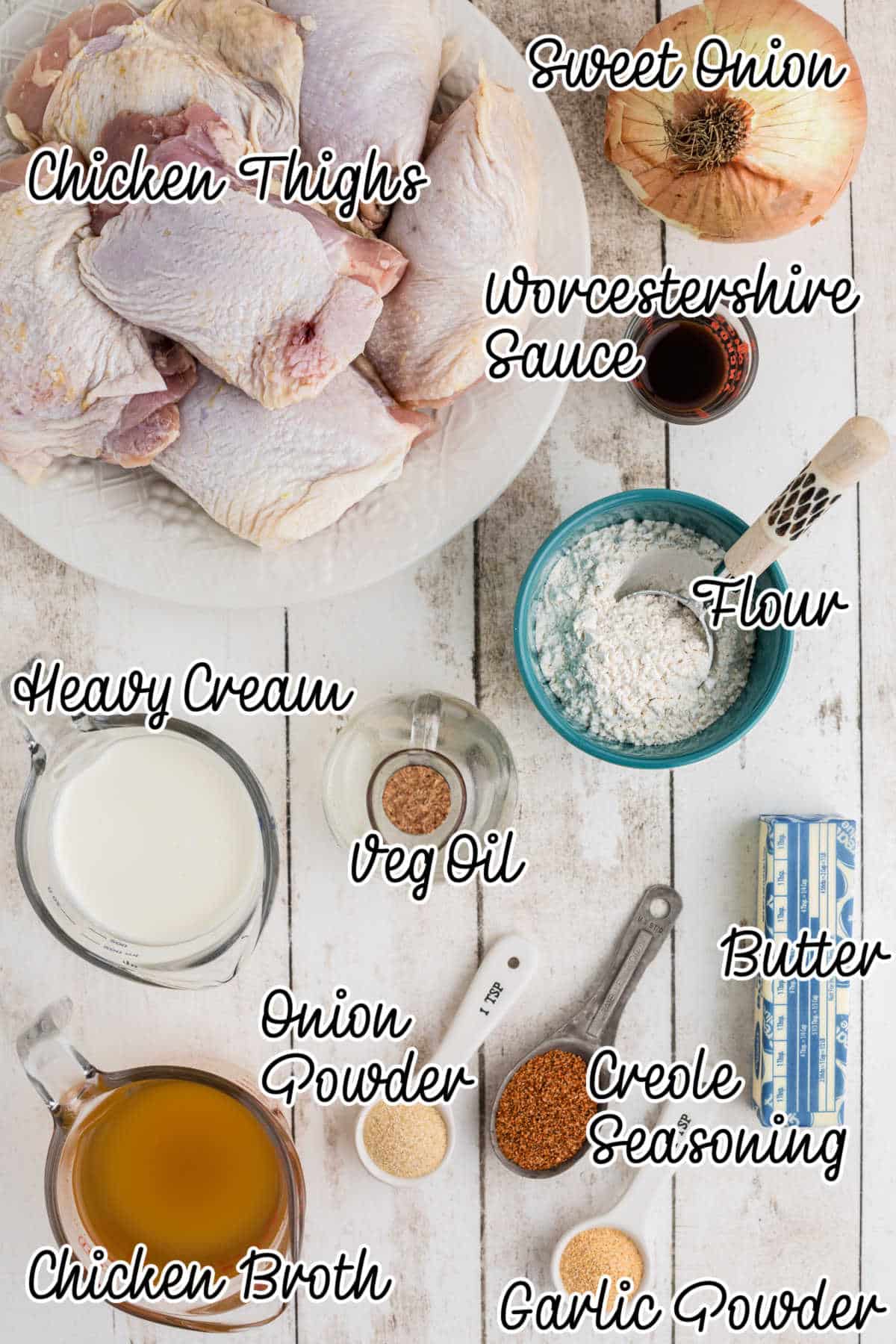 Overhead view of ingredients needed to make smothered chicken.
