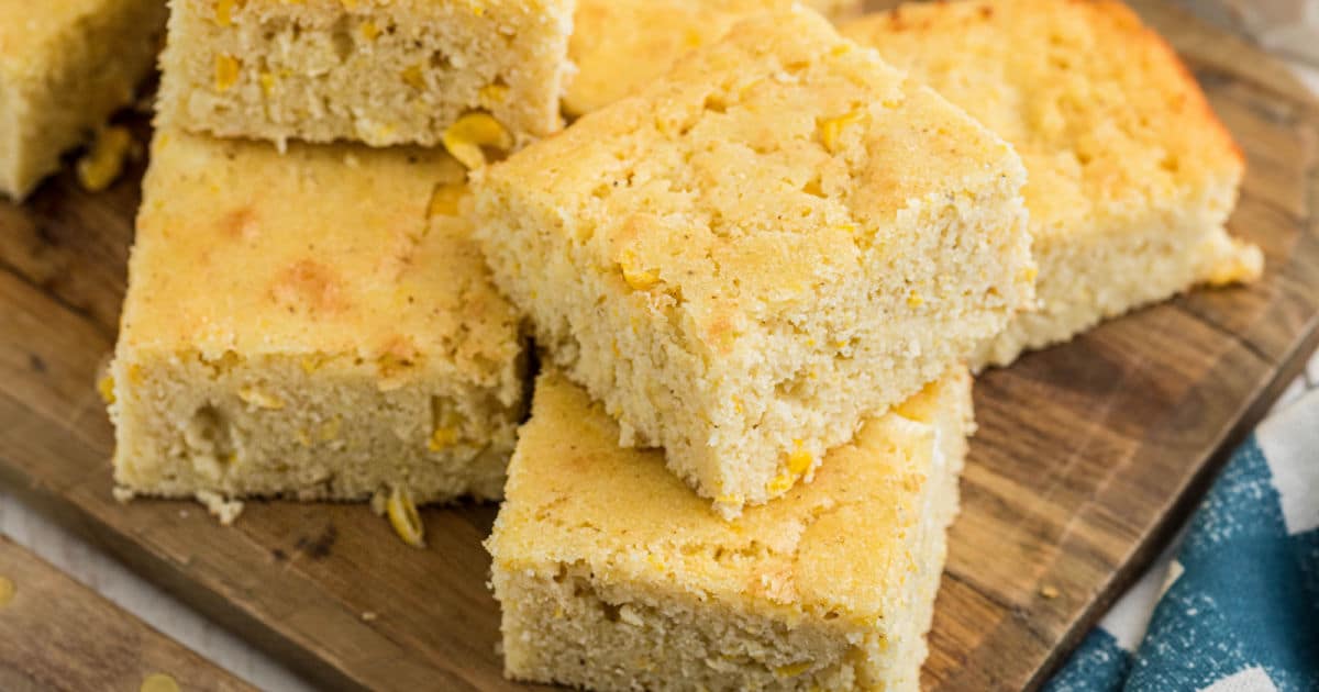 Close up of a pile of cornbread slices.