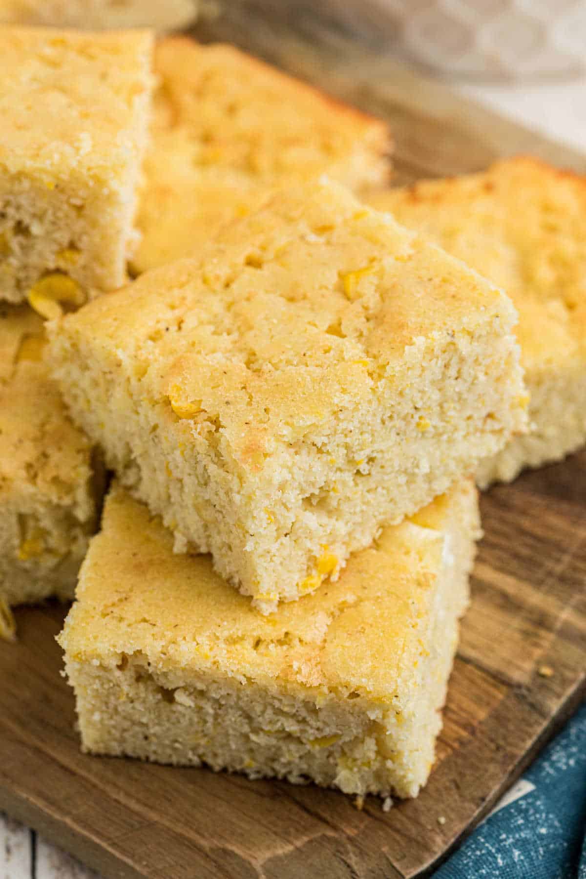 Two pieces stacked of sour cream cornbread.