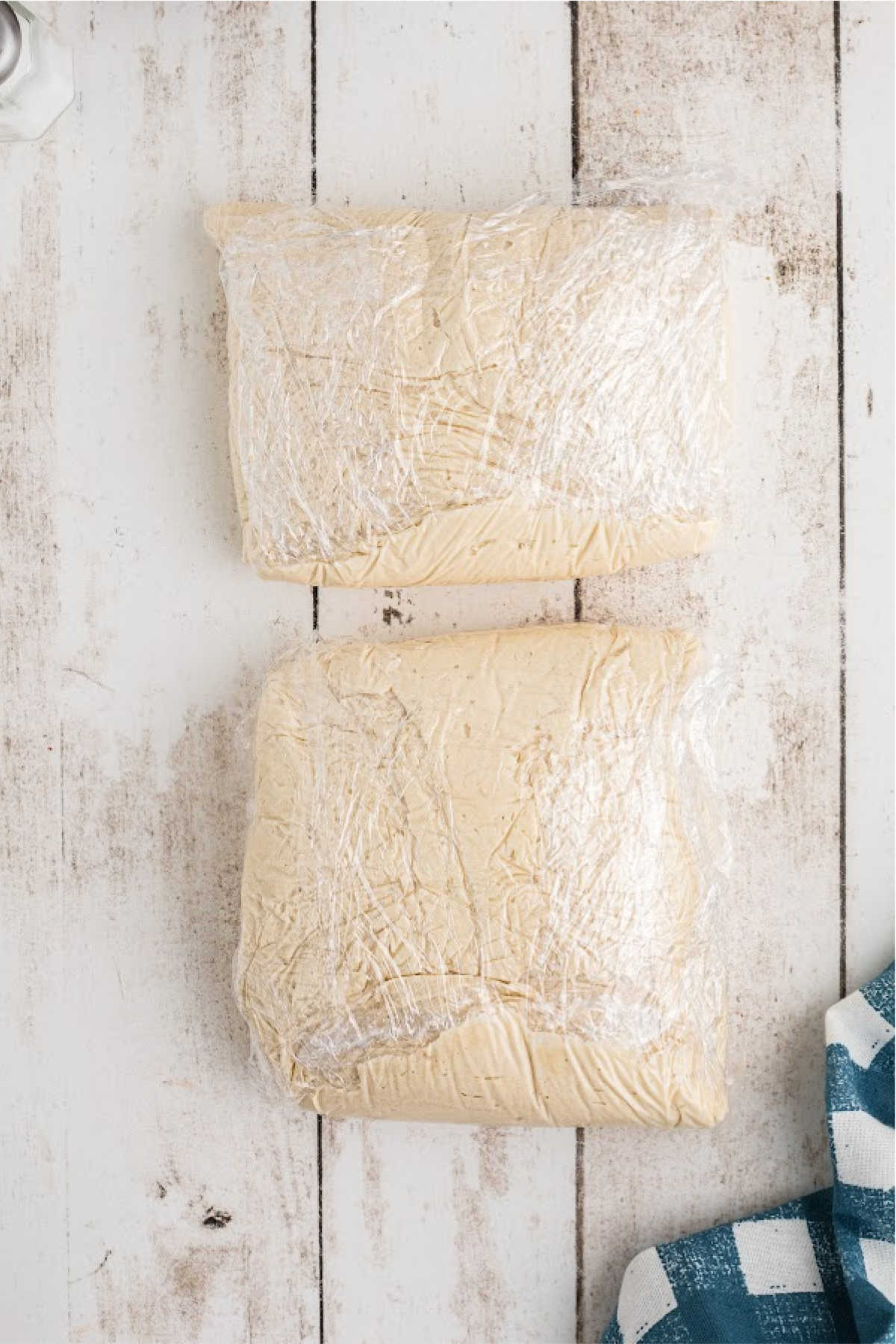 Cookie dough wrapped in plastic wrap.