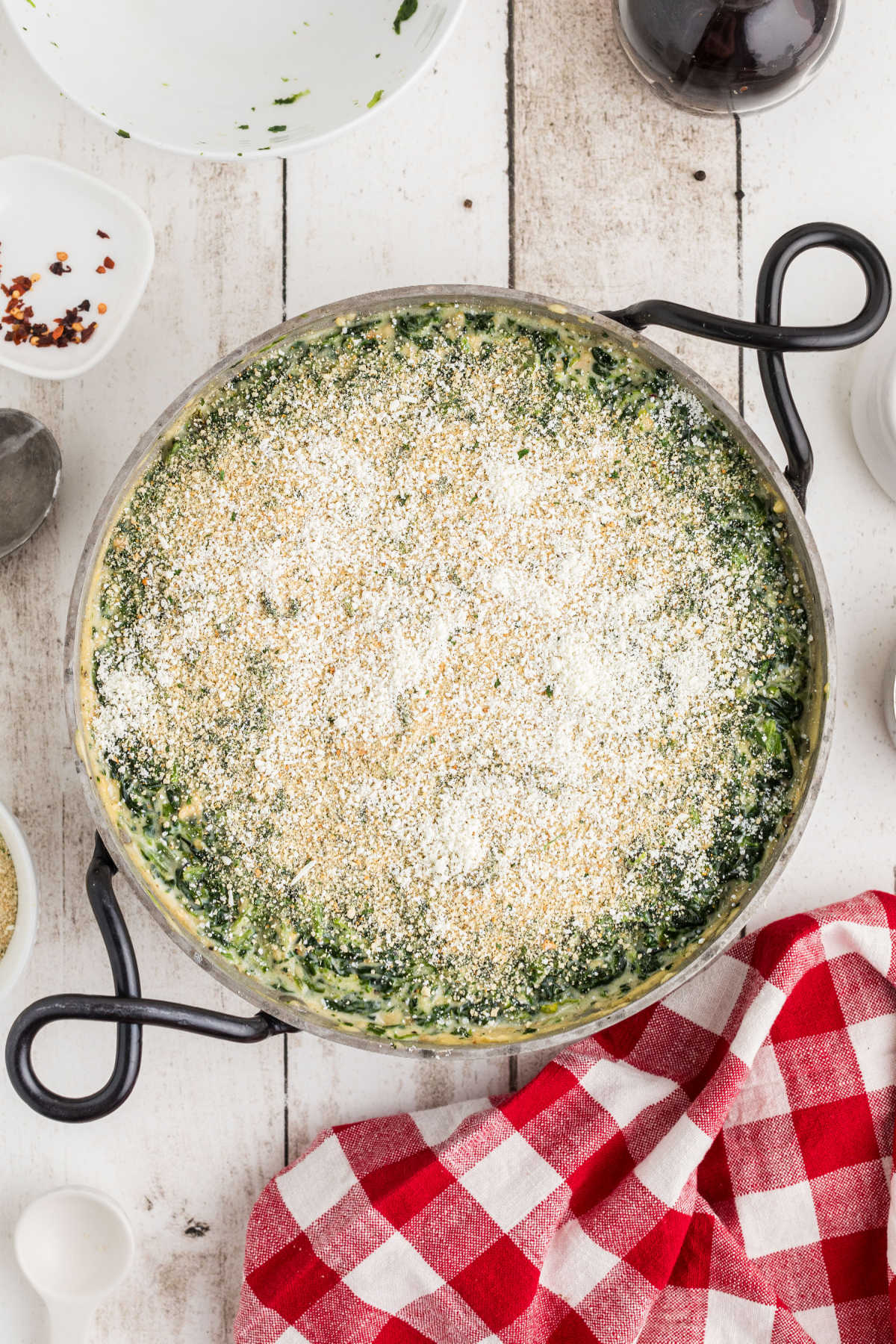 Breadcrumb mixture sprinkled on top of a spinach dish.