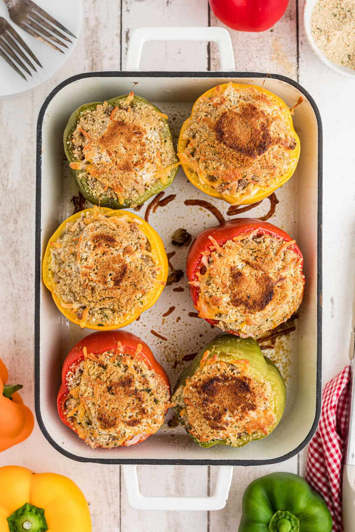 Overhead shot of a baking dish filled with stuffed bell peppers.