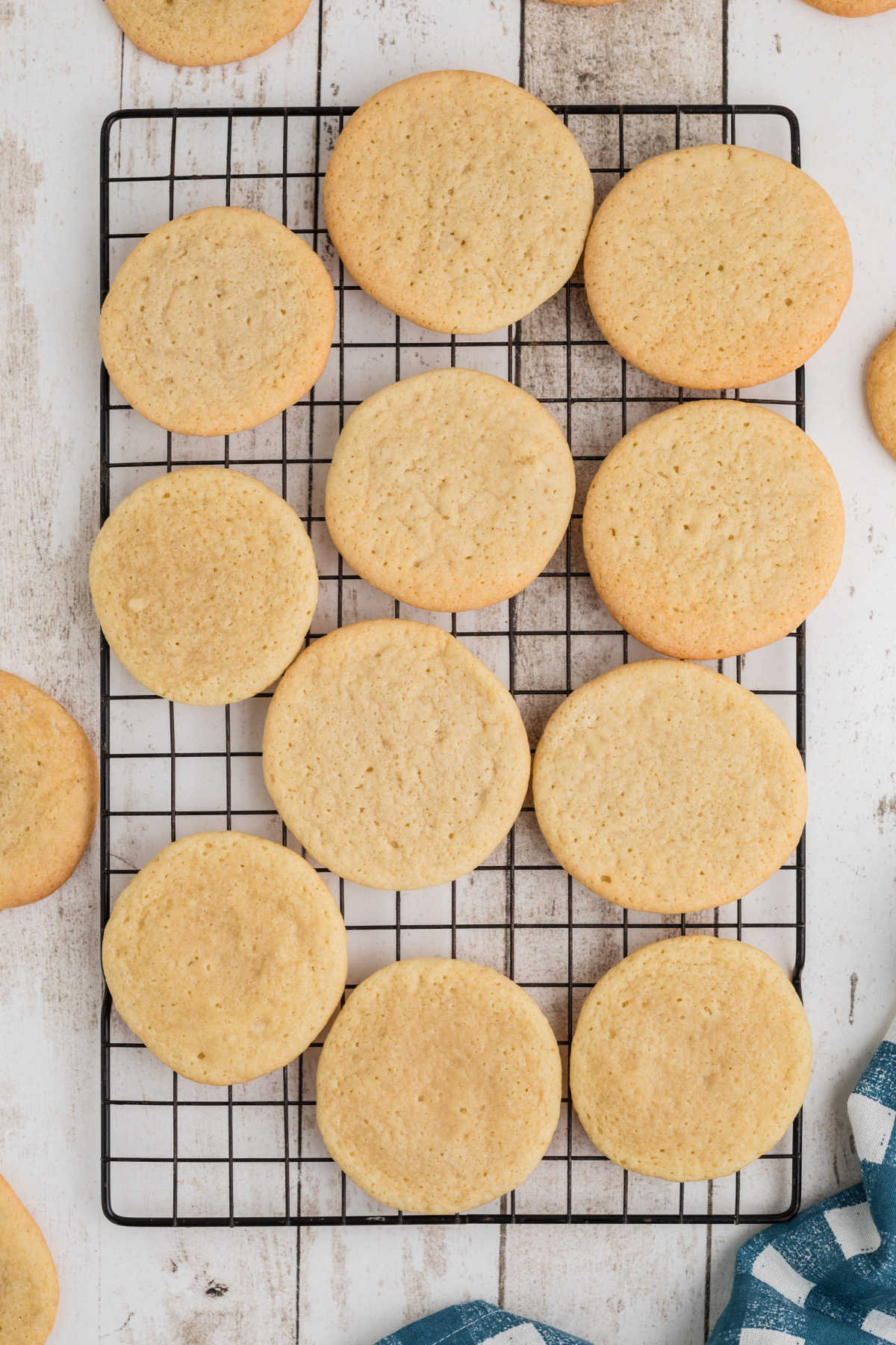 A cooling rack with some tea cakes, cooling down.