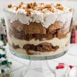 A gingerbread trifle in a glass trifle bowl.