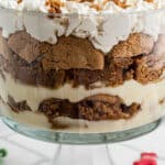 Side shot of a gingerbread trifle with text overlay for. pinterest.