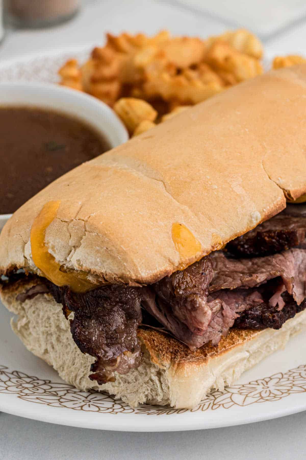 Close up of a prime rib sandwich.