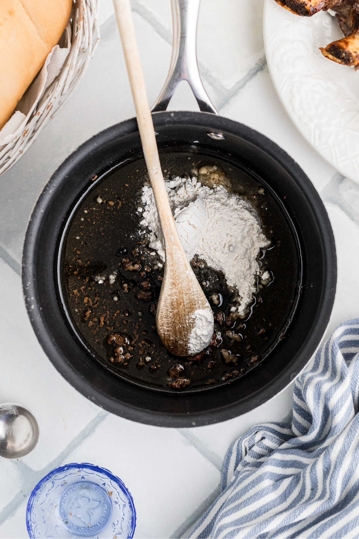 Flour added to drippings in a pan.