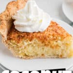 A slice of old fashioned coconut pie with a squirt of cream on top. There's text overlay for pinterest.