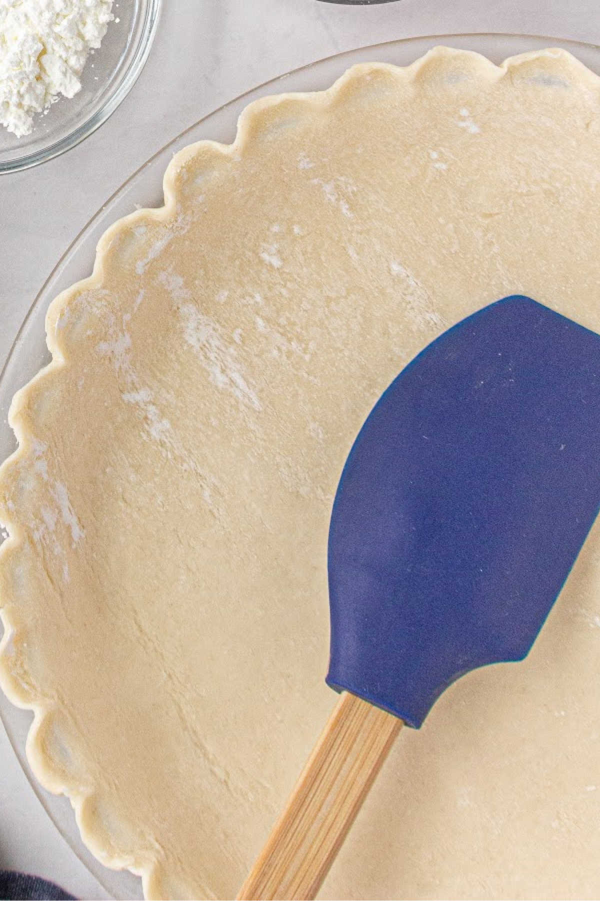 A pie crust prepared and ready to bake.