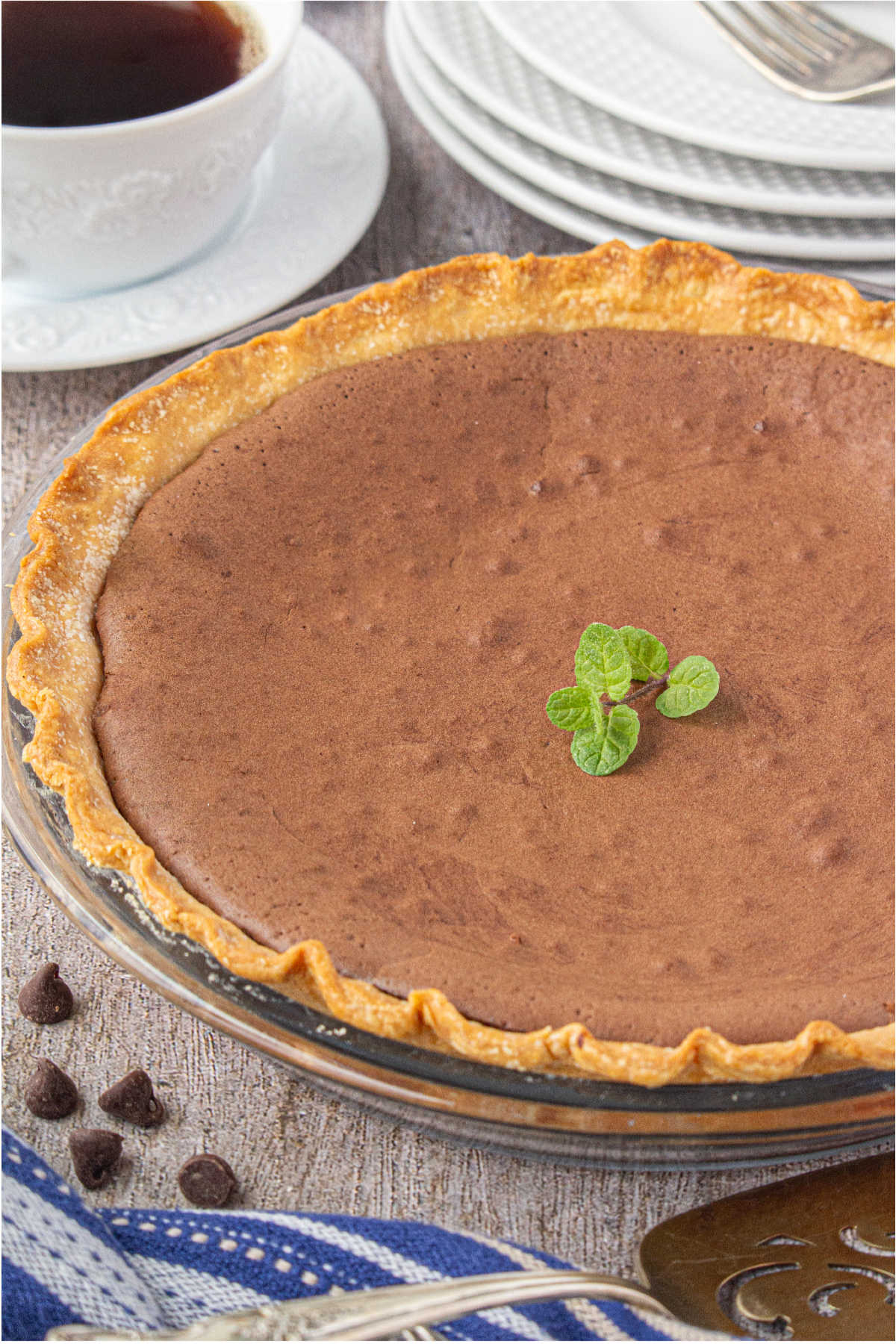 A chocolate chess pie ready to eat.
