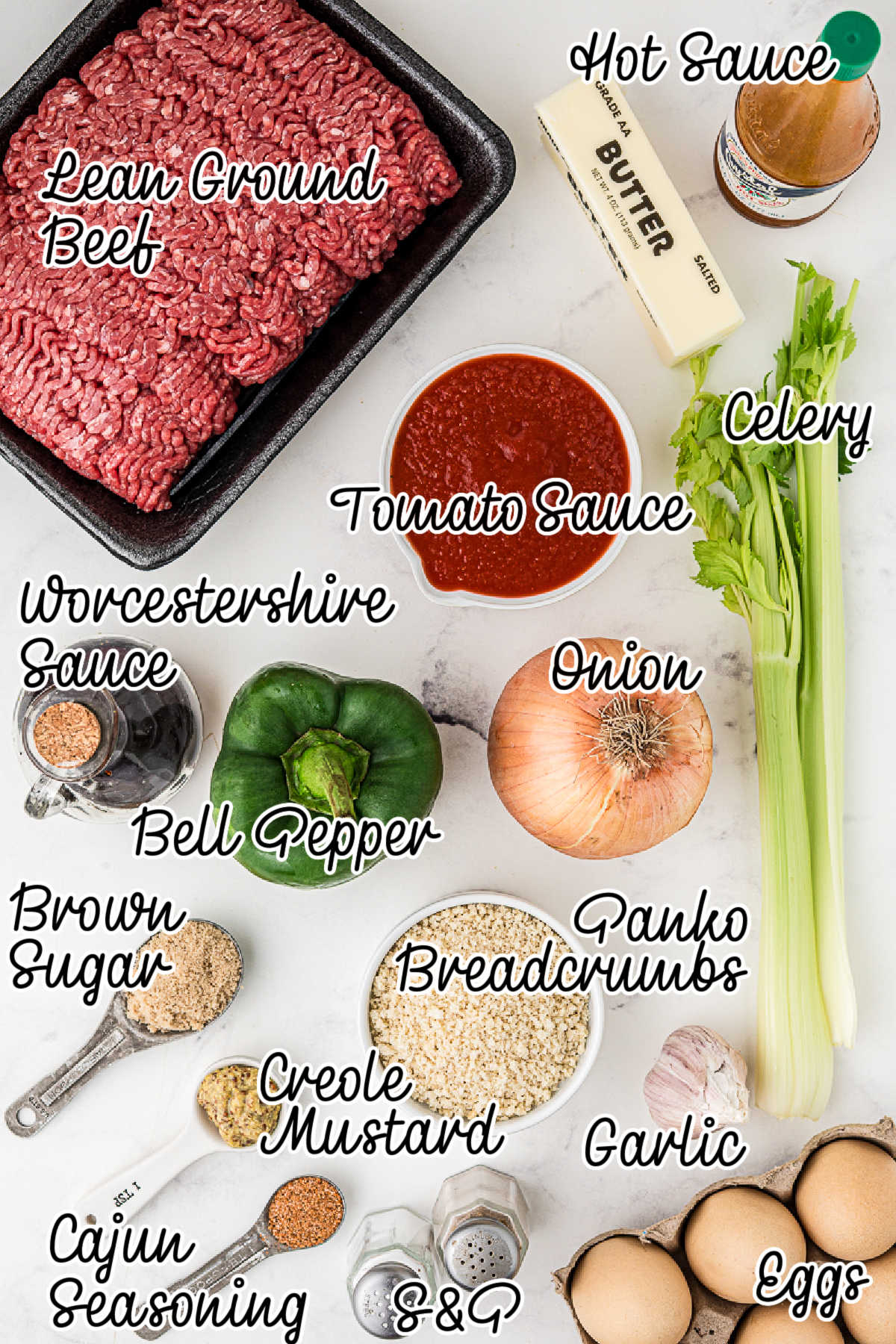Ingredients needed to make a Cajun meatloaf recipe, with text overlay.