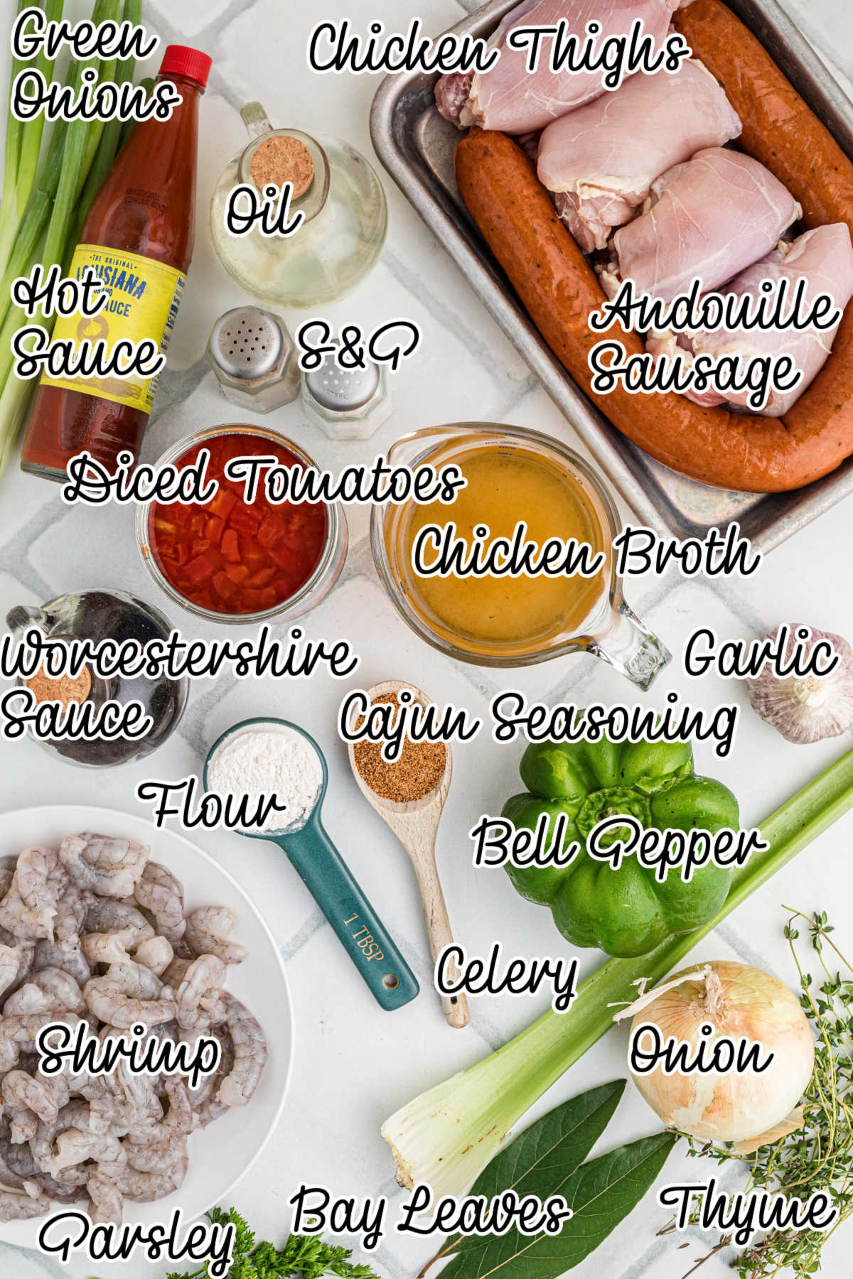 An overhead shot of groceries laid out showing what ingredients are going to be needed to make a gumbo in the Instant Pot.